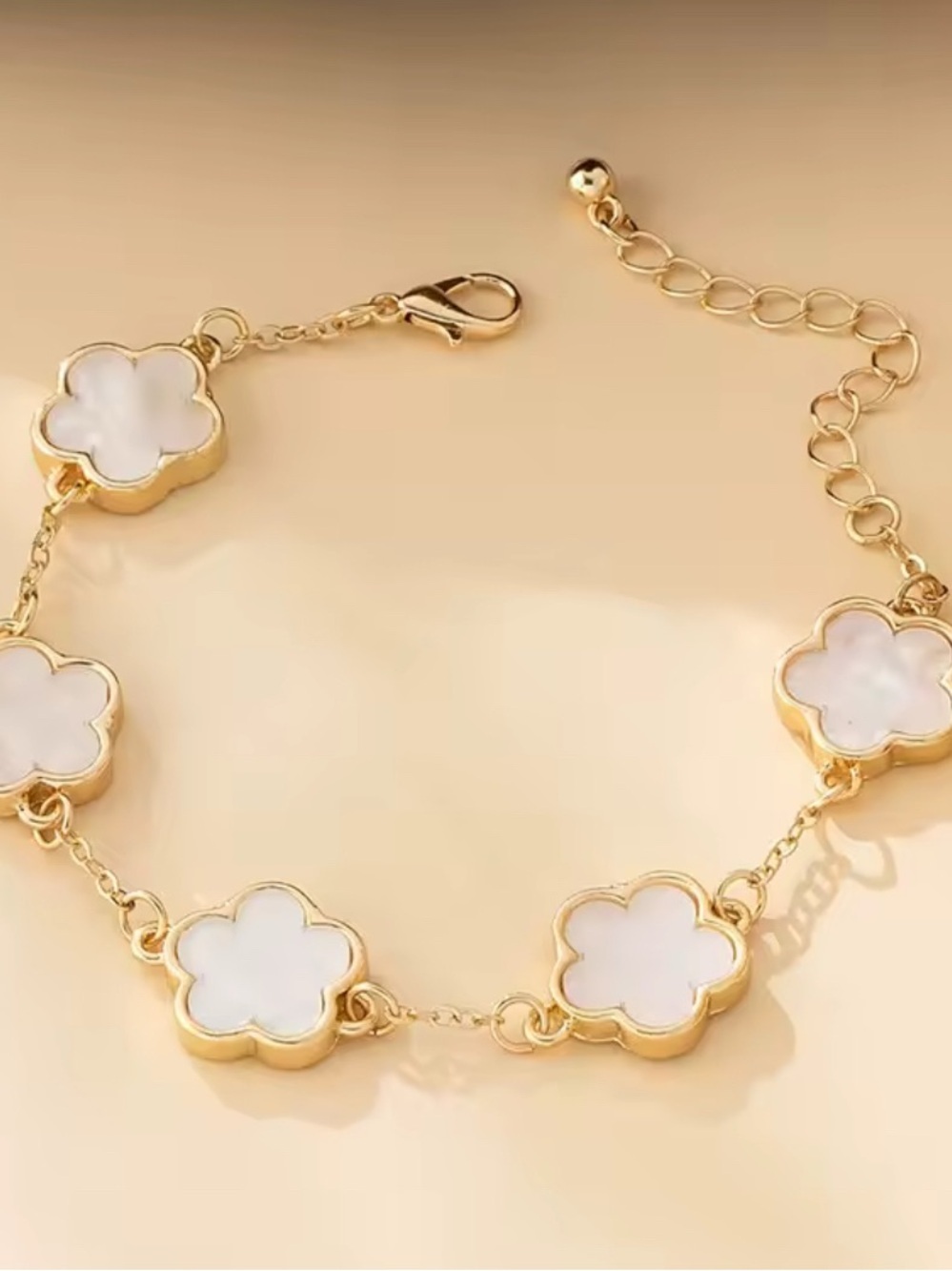 Elegant Gold and White Clover Link Bracelet